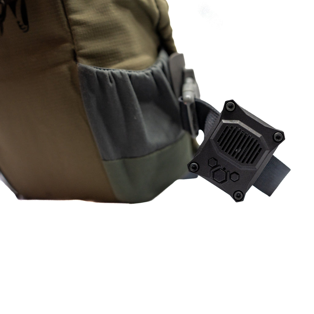 Angled view of the Talking Timer mounted on a green bag strap.
